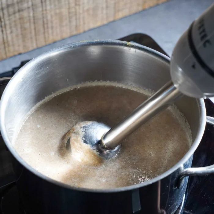 Blending with an immersion blender.
