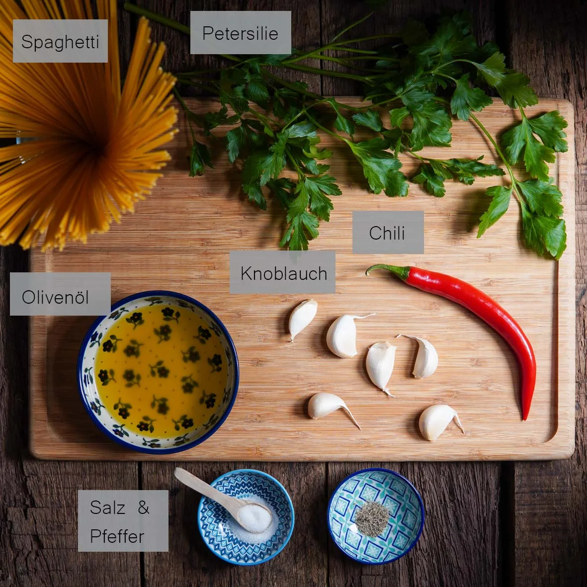 Ingredients for vegan spaghetti aglio e olio, seen from above